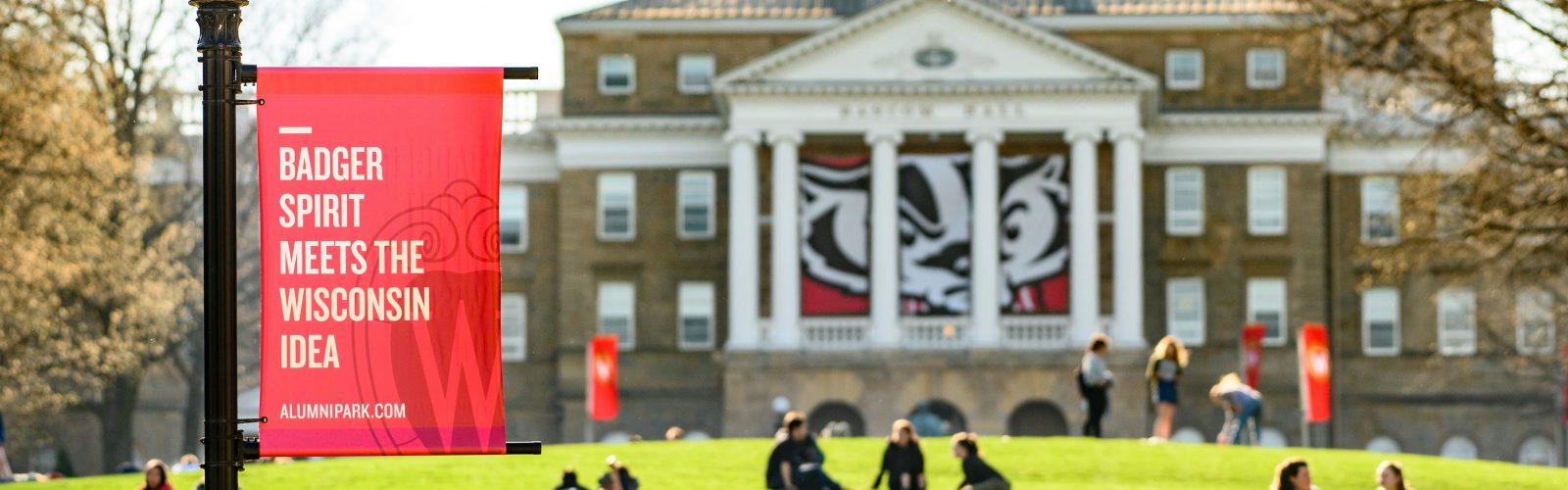 Students enjoy a warm spring day on Bascom Hill at the University of Wisconsin-Madison